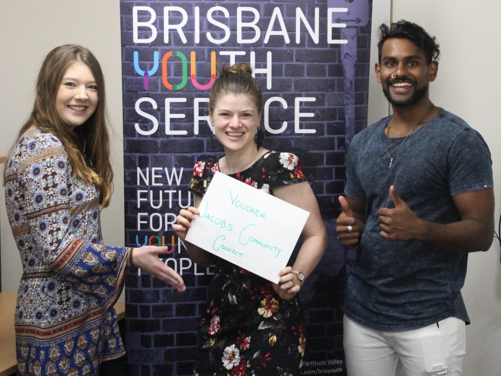 Jacobs present Brisbane Youth Service with voucher for TV purchase