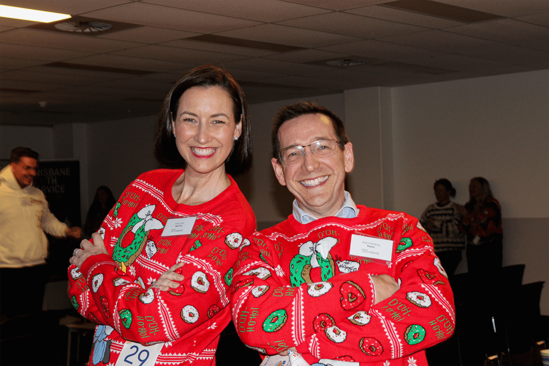 PeakCare CEO Kelly Jebb and Mapien Head of Workplace Psychology Blake Redding in matching jumpers
