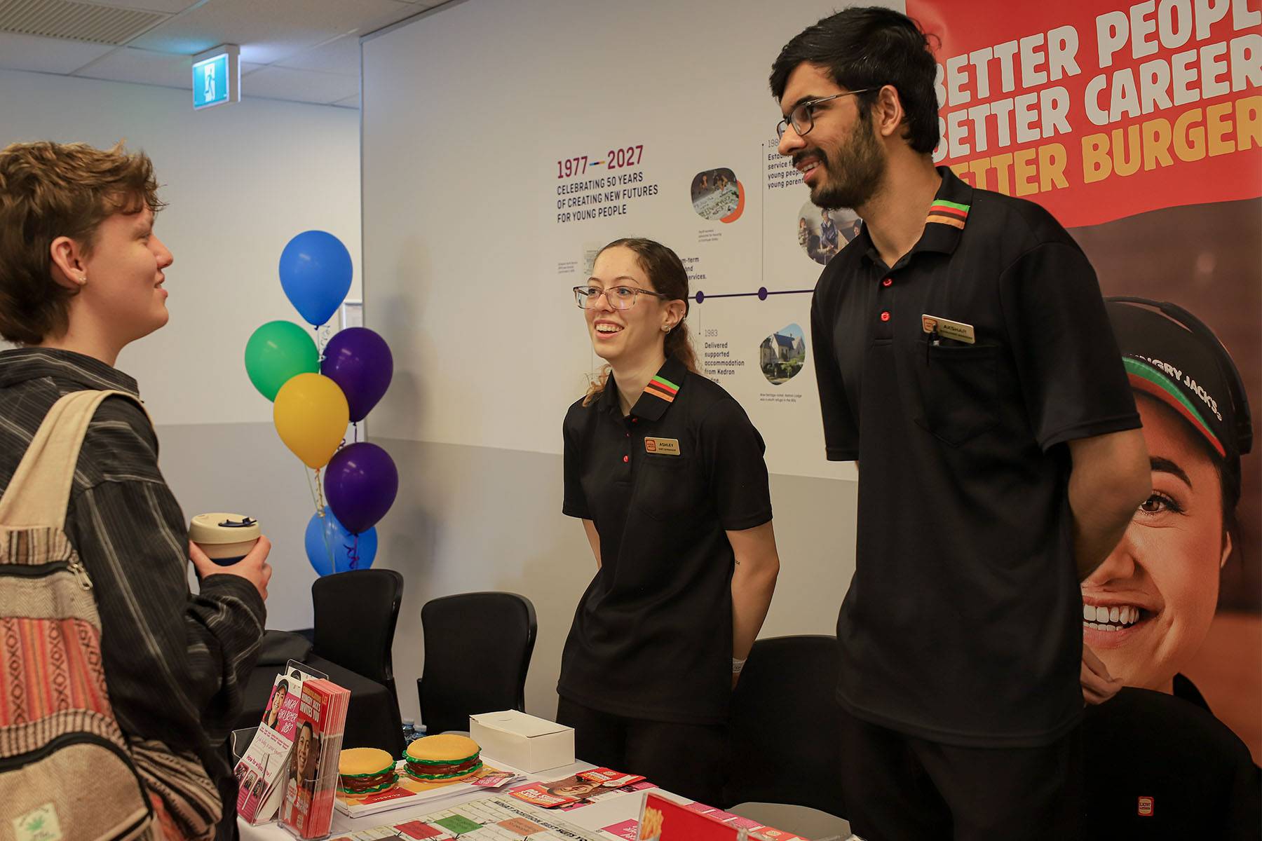Young person with Hungry Jacks representative