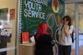 Young person with Positive Transitions Program Coordinator Amy Murphy at the Youth Support Centre