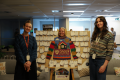 BYS employees Jordan Lucas, Jordan McCarthy and Charlotte Dawson pose with the Hope Wall